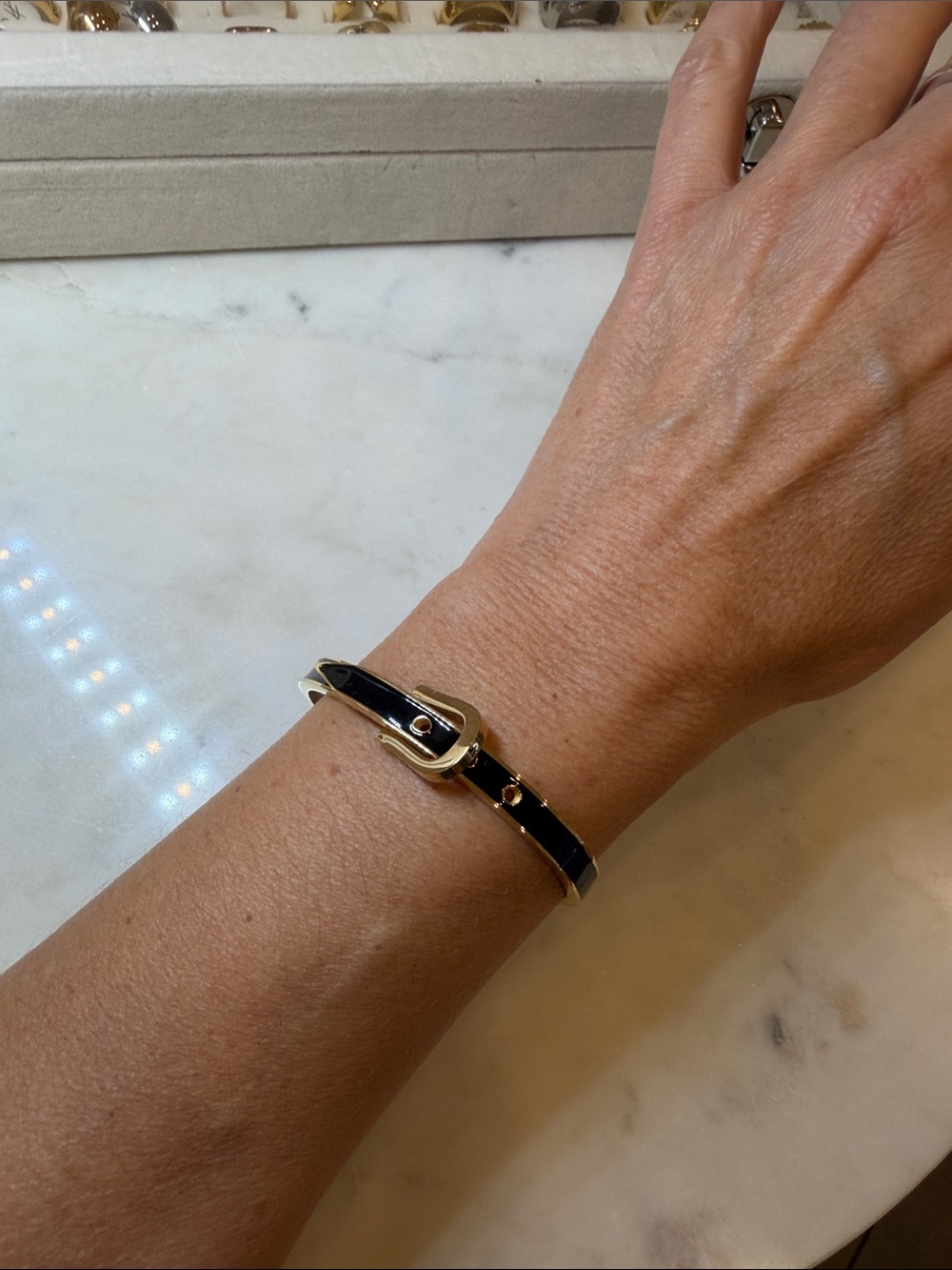 Gold-Tone Buckle Bracelet with Black Enamel Strap Stainless Steel.